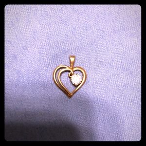 Gold and diamond pendant